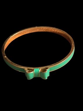 Kate Spade Gold-Tone Bangle with Green Enamel Bow Accent